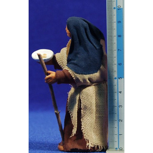 Pastora geperuda demanant 10 cm roba i fang