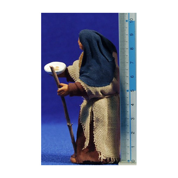 Pastora geperuda demanant 10 cm roba i fang