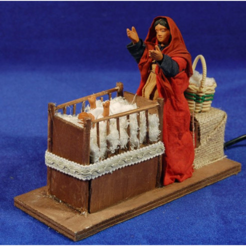 Woman raise children from a cradel movement 12 cm clay and clothes