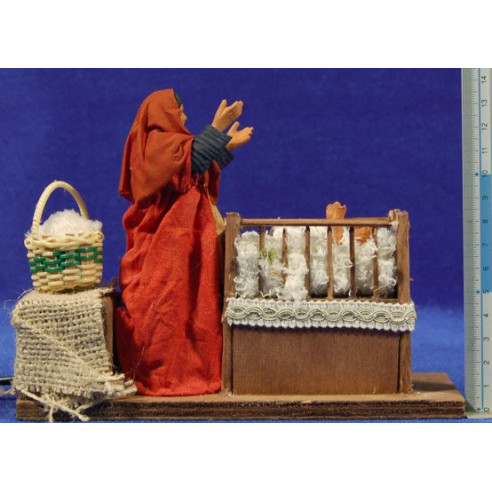 Woman raise children from a cradel movement 12 cm clay and clothes