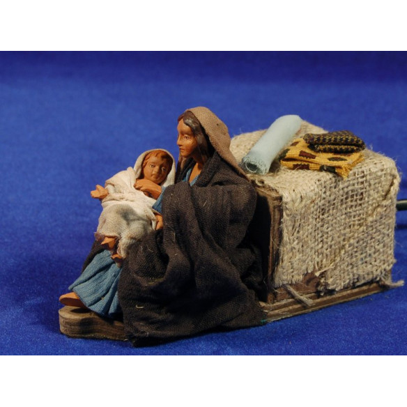 Mujer acariziando un niño movimiento 12 cm ropa y barro