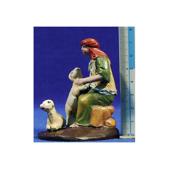 Shepherd seating with lambs 7 cm clay painted Figuralia