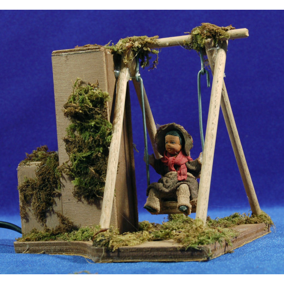Niño con columpio movimiento 12 cm barro pintado
