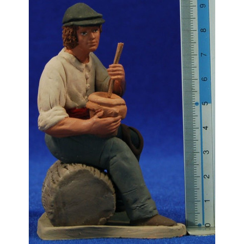 Pastor musico sentado con zambomba 12 cm barro pintado Delgado