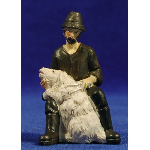 Shepherd shearing a lamb 9 cm resin
