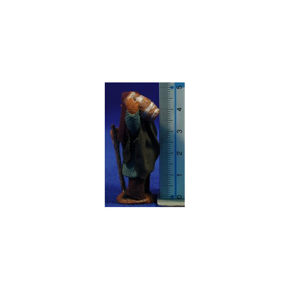 Pastor con bota 5 cm ropa y barro
