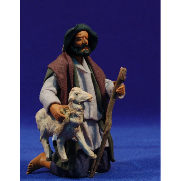 Shepherd addoring with a lamb 16 cm clay and clothes