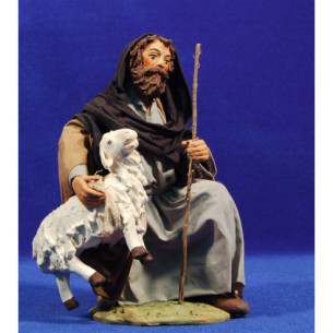 Uomo in ginocchio con pecora sotto braccio 25 cm stoffe e terracotta