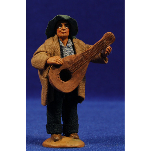 Uomo musicista con chitarra 9 cm fango e fango