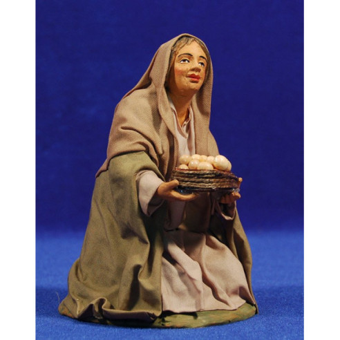 Pastora adorant amb cistells ous 20 cm roba i fang