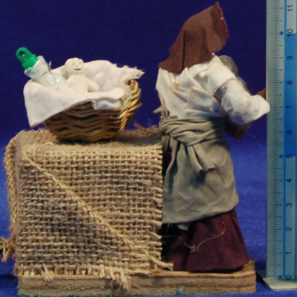 Woman with a baby movement 10 cm clay and clothes