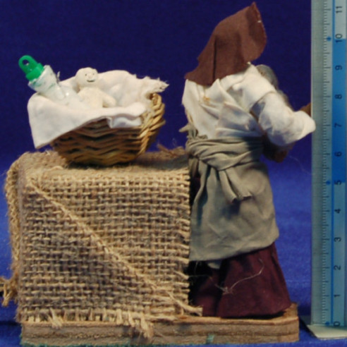 Pastora con niño movimiento 10 cm ropa y barro