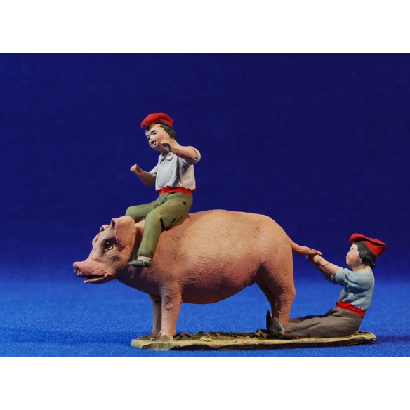 Children playing with pig 10 cm clay painted De Francesco