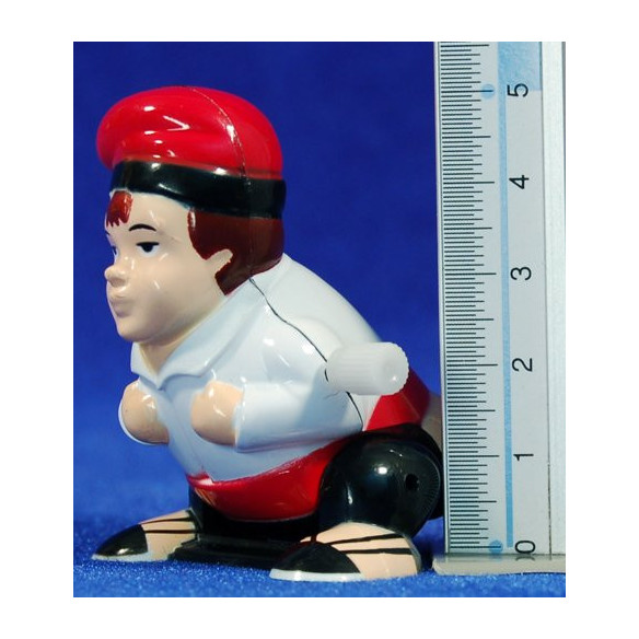 Caganer salta 10 cm plástico