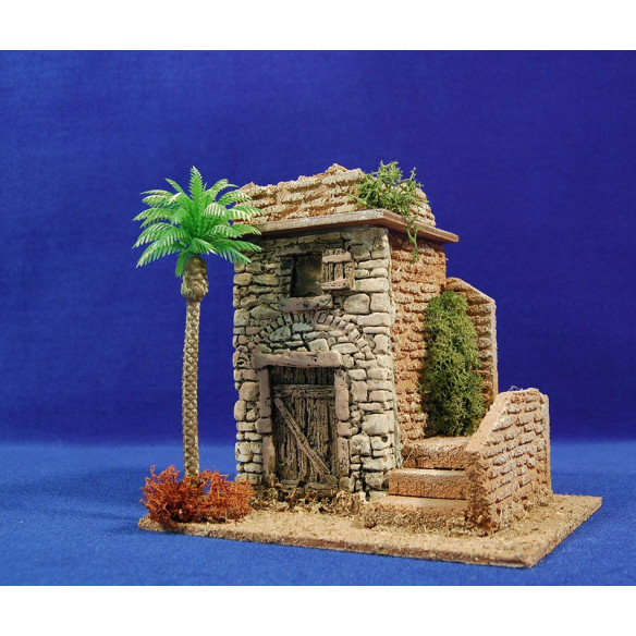 Casa con escalera con palmera 19x15x18 cm corcho yeso plastico