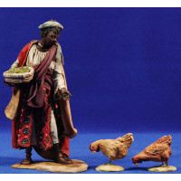 Pastora negra con gallinas 18 cm barro y tela pintada Angela Tripi
