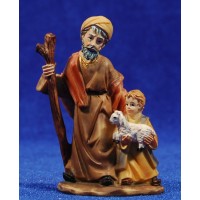 Pastor viejo con niño y cordero pequeño en brazos 7 cm resina